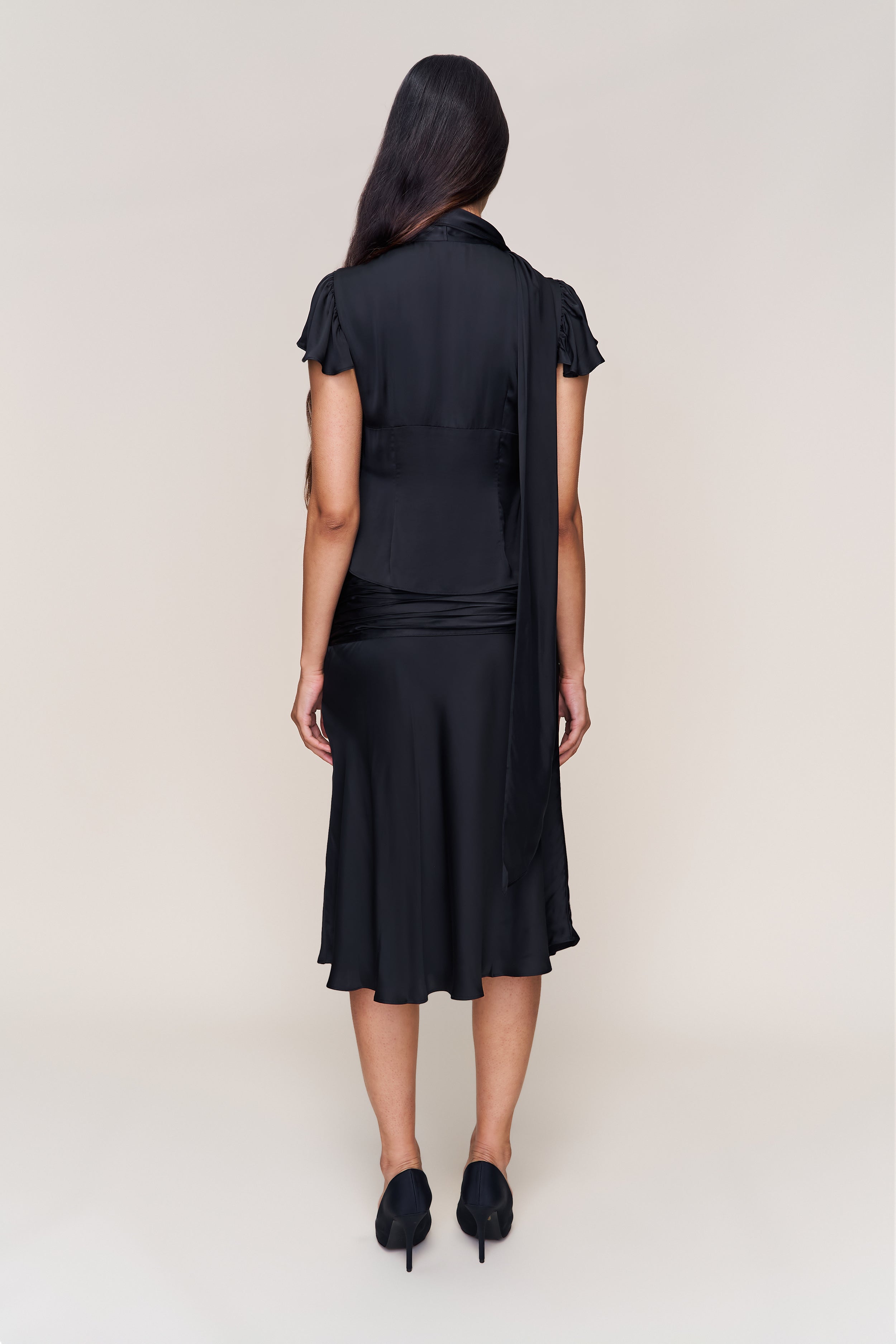 Eda Satin Midi Skirt in Black