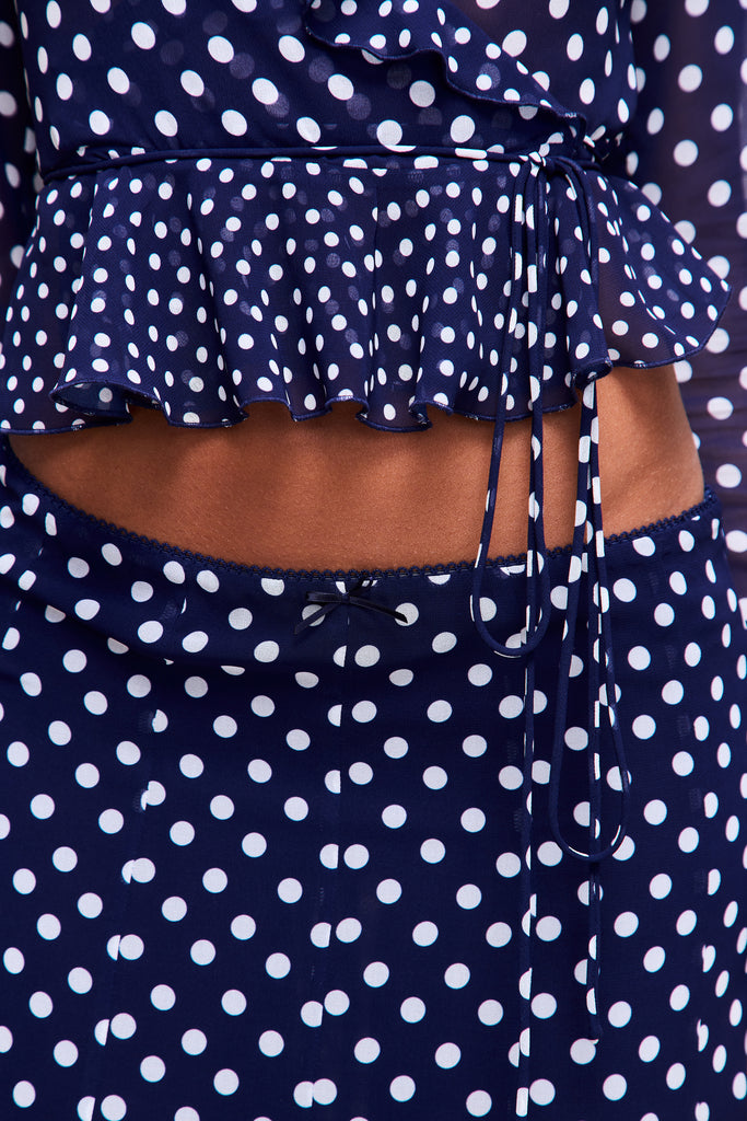 Mallorca Ruffle Wrap Top in Navy Mixed Polka Dot 